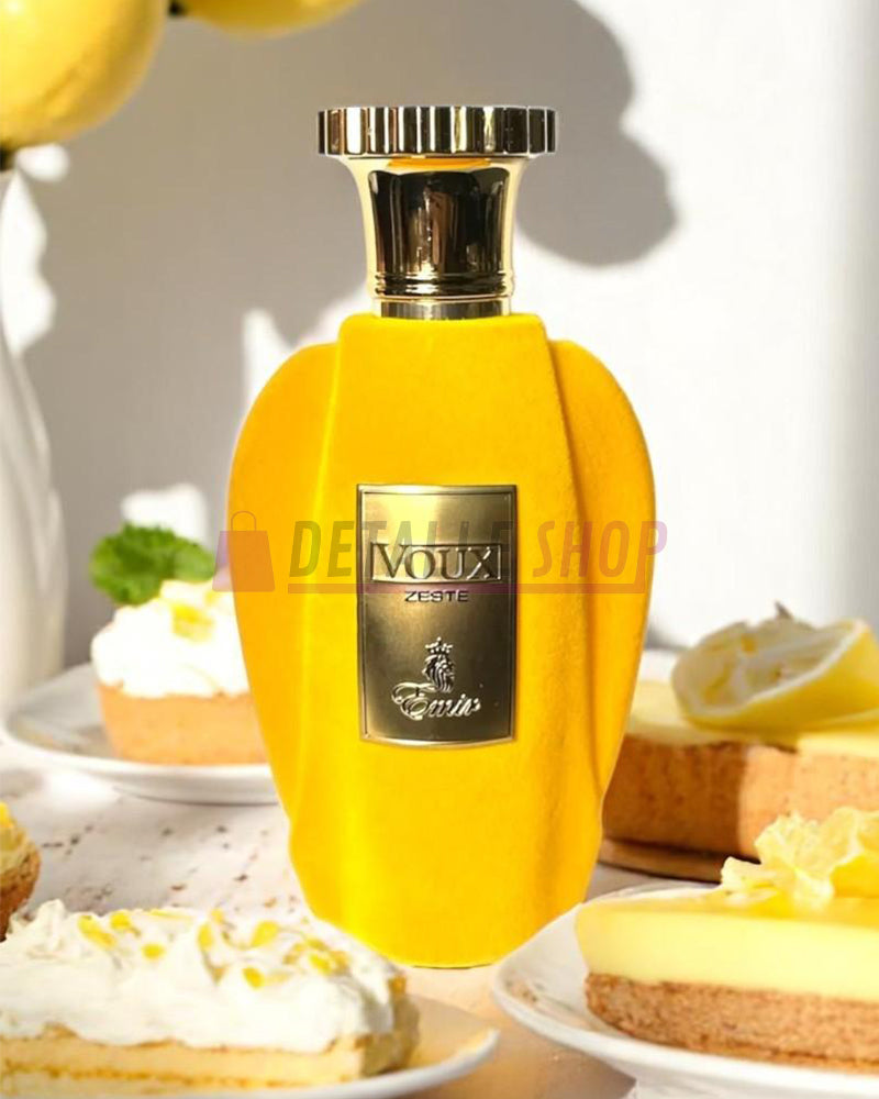 Botella amarilla del perfume Voux Zeste de Paris Corner, diseño premium y aroma de lujo unisex