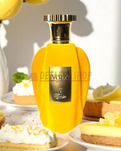 Botella amarilla del perfume Voux Zeste de Paris Corner, diseño premium y aroma de lujo unisex