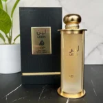 Perfume árabe unisex Lattafa Pride Leen de 100ml sobre fondo veraniego