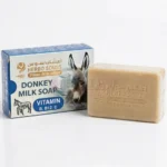 Caja y pastilla de jabón natural de leche de burra Herbo Souss con vitaminas B, B12 y C para la piel
